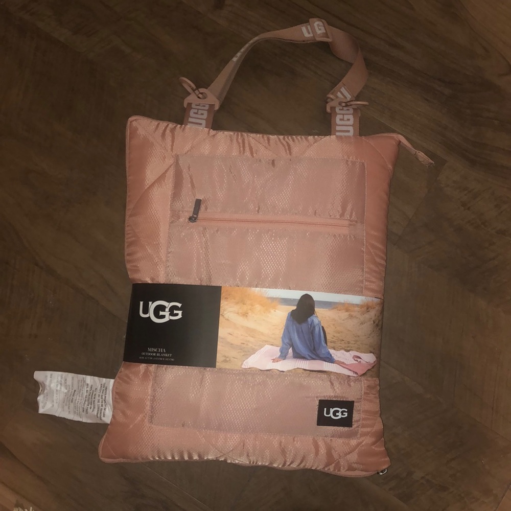 Foldable ugg rose gold pink blanket with strap
